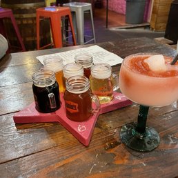 Beer flight and a strawberry piña colada! Beer flight and a strawberry piña colada!