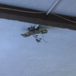 Bare wires in ceiling. Bare wires in ceiling.