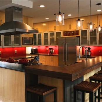 Michaud Enterprises - Bamboo cabinets, back painted glass, Chroma quartz counter tops, waterfall counertop returns, walnut floating bar top - General Contractors Near Me - Farmington, Connecticut Michaud Enterprises - Bamboo cabinets, back painted glass, Chroma quartz counter tops, waterfall counertop returns, walnut floating bar top - General Contractors Near Me - Farmington, Connecticut