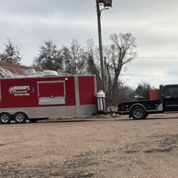 Long view of food trailer and truck