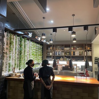 Vida - The kitchen! I really dig the wall o' greens! - New American Near Me - Indianapolis, Indiana Vida - The kitchen! I really dig the wall o' greens! - New American Near Me - Indianapolis, Indiana
