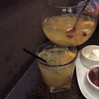 Sinigual - White sangria globe - Mexican Near Me - Manhattan, New York Sinigual - White sangria globe - Mexican Near Me - Manhattan, New York