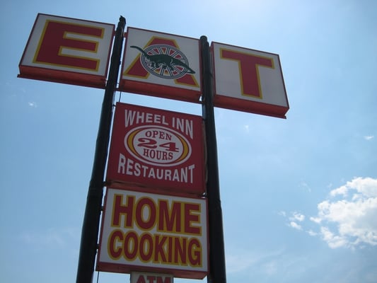 Photo of Wheel Inn Restaurant - Cabazon, CA, US. The Wheel Inn "EAT" sign becons weary travelers