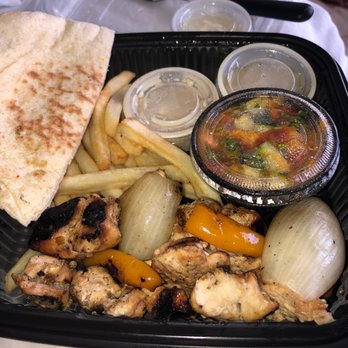 Maya's Modern Mediterranean - Honey chicken plate with Maya's Chopped Salad and air Air-Baked Fries - Mediterranean Near Me - Dallas, Texas