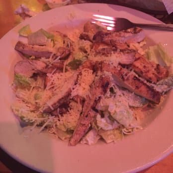 Texas Roadhouse - Grilled Chicken Caesar Salad. Sorry bout the light. They have mood lighting - Steakhouses Near Me - Denton, Texas Texas Roadhouse - Grilled Chicken Caesar Salad. Sorry bout the light. They have mood lighting - Steakhouses Near Me - Denton, Texas