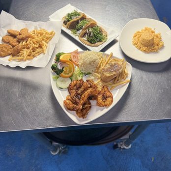 Mariscos El Tiburon - Chicken nuggets, camarones zarandeados side of rice and three steak tacos - Seafood Near Me - Blue Island, Illinois Mariscos El Tiburon - Chicken nuggets, camarones zarandeados side of rice and three steak tacos - Seafood Near Me - Blue Island, Illinois