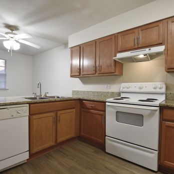 Lanai - Renovated Kitchen with Granite Countertops - Apartments Near Me - Metairie, Louisiana Lanai - Renovated Kitchen with Granite Countertops - Apartments Near Me - Metairie, Louisiana