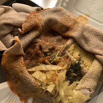 Das Ethiopian - Das Vegetarian Entree Sampler-- injera unfolded revealing the yummy sampler - Ethiopian Near Me - Washington, DC, District of Columbia Das Ethiopian - Das Vegetarian Entree Sampler-- injera unfolded revealing the yummy sampler - Ethiopian Near Me - Washington, DC, District of Columbia