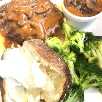 Outback Steakhouse - Chop steak with baked potato , broccoli and gravy - Steakhouses Near Me - Fultondale, Alabama Outback Steakhouse - Chop steak with baked potato , broccoli and gravy - Steakhouses Near Me - Fultondale, Alabama