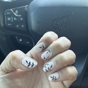 M Nail Studio - My fiance loves black and I didn't want all black nails so I had light creme pink with black vibe and leaves. My fiance loves it! :) - Nail Salons Near Me - Sacramento, California M Nail Studio - My fiance loves black and I didn't want all black nails so I had light creme pink with black vibe and leaves. My fiance loves it! :) - Nail Salons Near Me - Sacramento, California