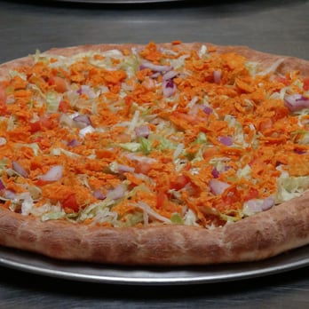 Bourbon Street Pizza - a pizza topped with shredded cheese and carrots - Pizza Near Me - Bourbon, Indiana