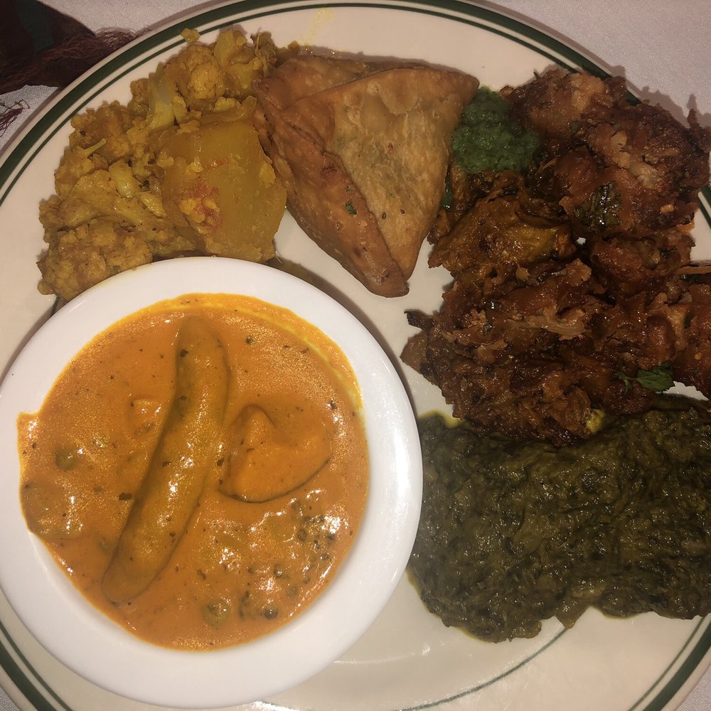 India Kitchen Tustin, CA - Lunch buffet, round 1: Veggie korma, saag, Chinese fried cauliflower, fried cauliflower, samosa, aloo gobi. - Indian Near Me - Tustin, California