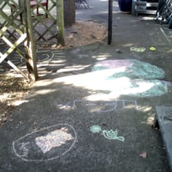 Perfect Hearts Yoga - Kids art on our walkway to the studio after a Kids Yoga class