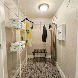 Super spacious walk in closet with everything you need. Super spacious walk in closet with everything you need.