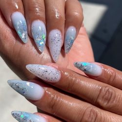 Hard gel set, milky white with blue Mylar & silver flakes.