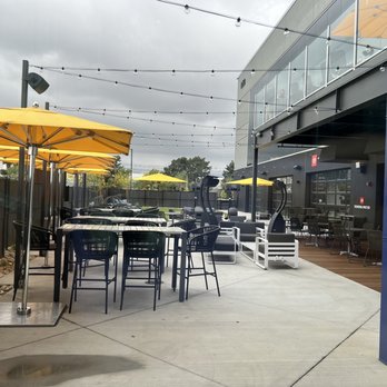 Topgolf - 1st floor outdoor bar area - Sports Bars Near Me - Ontario, California