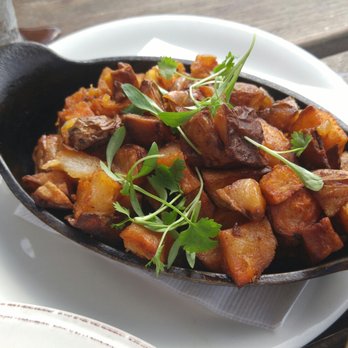 Barcocina - Pefectly cooked skillet taters.     So good. - Bars Near Me - Baltimore, Maryland