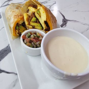 Hen House - Breakfast Burrito with a side of Cauliflower soup. - Sandwiches Near Me - Gretna, Louisiana Hen House - Breakfast Burrito with a side of Cauliflower soup. - Sandwiches Near Me - Gretna, Louisiana