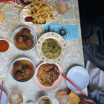 Oma's Hideaway - Oma's Corn Fritters  Cheesy Roti Canai - Asian Fusion Near Me - Portland, Oregon
