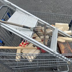 Goodwill Outlet Store - $43 = mini shovel, small sized rake, aluminum ladder, some Jenga pieces, old yellowed Christmas lights and a box and very poor shape.