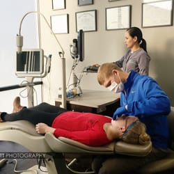 Collins Orthodontics - Dr. Collins working with my oldest daughter. © Dean Riggott Photography
