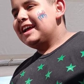 Rodriguez Paletas - a young man with green stars on his shirt - Food Trucks Near Me Rodriguez Paletas - a young man with green stars on his shirt - Food Trucks Near Me