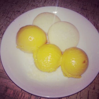 How to Cook a Wolf - Mango sorbet, seasonal - Italian Near Me - Seattle, Washington