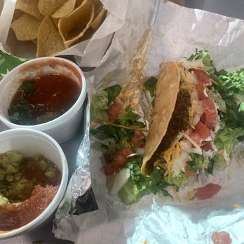 Laredo Taco Company - Ground beef crispy taco with generous toppings, guacamole, salsa and chips - Tacos Near Me - Melbourne, Florida