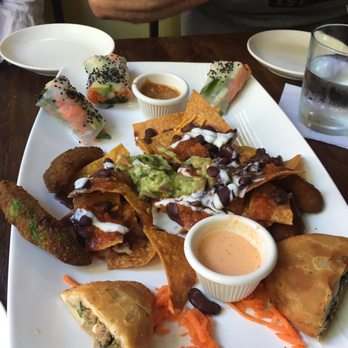 VSPOT - This is the share platter with avocado fries (half eaten ;) I love the nachos. - Vegan Near Me - Brooklyn, New York VSPOT - This is the share platter with avocado fries (half eaten ;) I love the nachos. - Vegan Near Me - Brooklyn, New York