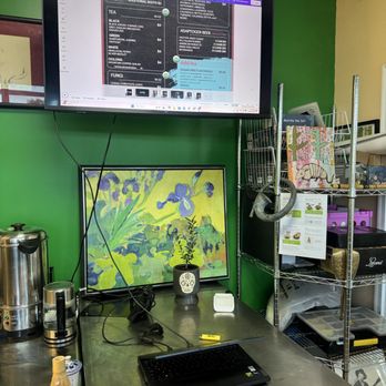 Lovely - Inside the shop with irises painting and the tv menu - Tea Rooms Near Me - Aurora, Colorado Lovely - Inside the shop with irises painting and the tv menu - Tea Rooms Near Me - Aurora, Colorado