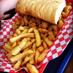 Overstuffed small crawfish poboy with fries