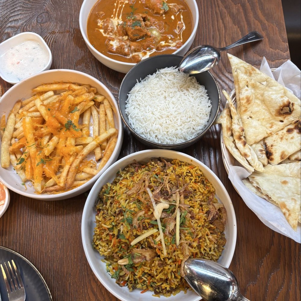 Tikka Shots - The Goat Affair Biryani Chicken Tikka Masala Butter Naan Sez Masala Fries - Indian Near Me - Portland, Oregon Tikka Shots - The Goat Affair Biryani Chicken Tikka Masala Butter Naan Sez Masala Fries - Indian Near Me - Portland, Oregon