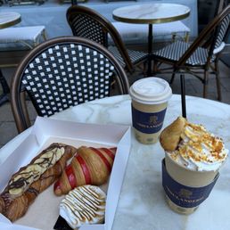 Banana chocolate pastry, raspberry croissant, lime tart, creme brûlée latte, and caramel apple latte