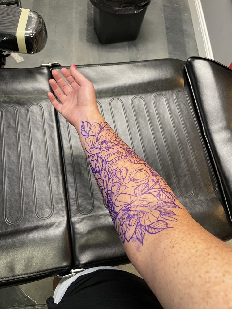 Invoke Tattoo and Art Gallery Logo