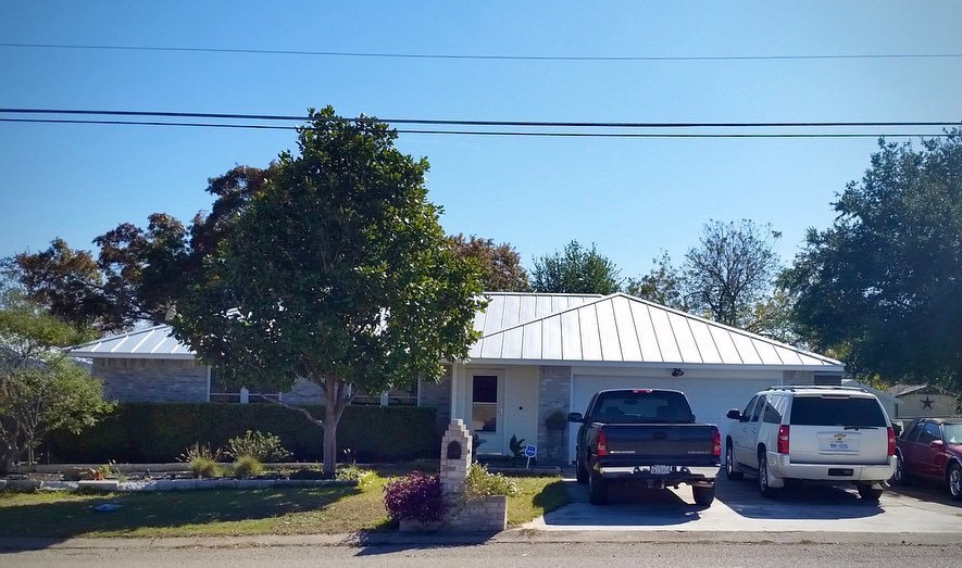 Slide of Roland's Roofing