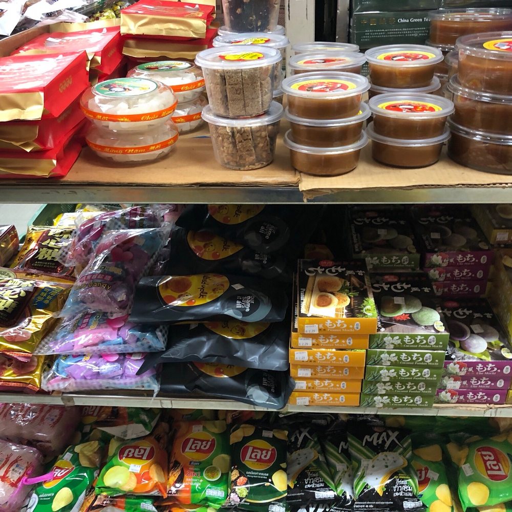 Far East Center - Chinese New Year sweet cake on top shelf and other new year treats - International Grocery Near Me - Los Angeles, California Far East Center - Chinese New Year sweet cake on top shelf and other new year treats - International Grocery Near Me - Los Angeles, California
