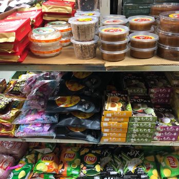 Far East Center - Chinese New Year sweet cake on top shelf and other new year treats - International Grocery Near Me - Los Angeles, California Far East Center - Chinese New Year sweet cake on top shelf and other new year treats - International Grocery Near Me - Los Angeles, California