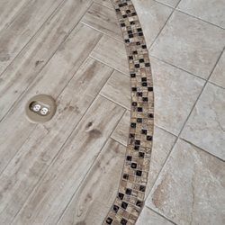 Linda Elkins Designs - Marrying up new tile with existing tile flooring!