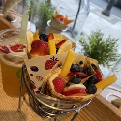 11. T-swirl Fruits Cocktail Crepe split in half - delicious