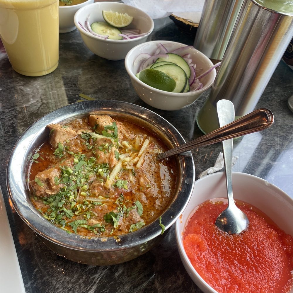 BK Khan BBQ - Aloo Chohlay & Puri Paratha, Chicken kadhai half tray, Halwa & Mango Lassi - Barbeque Near Me - Dallas, Texas