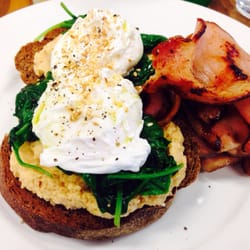 Modish5 - Rye bread, Hummus, spinach, poached eggs, sesame seeds. Ordered a side of bacon.