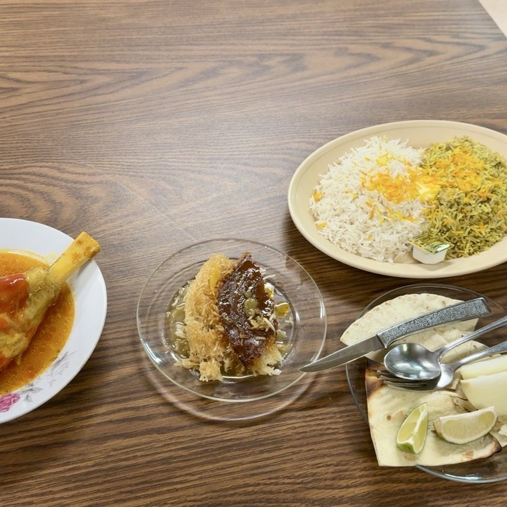 Samad Cafe - Lamb shank, Plate of white Basmati rice with Saffron, tahdig - Persian/Iranian Near Me - Dallas, Texas Samad Cafe - Lamb shank, Plate of white Basmati rice with Saffron, tahdig - Persian/Iranian Near Me - Dallas, Texas