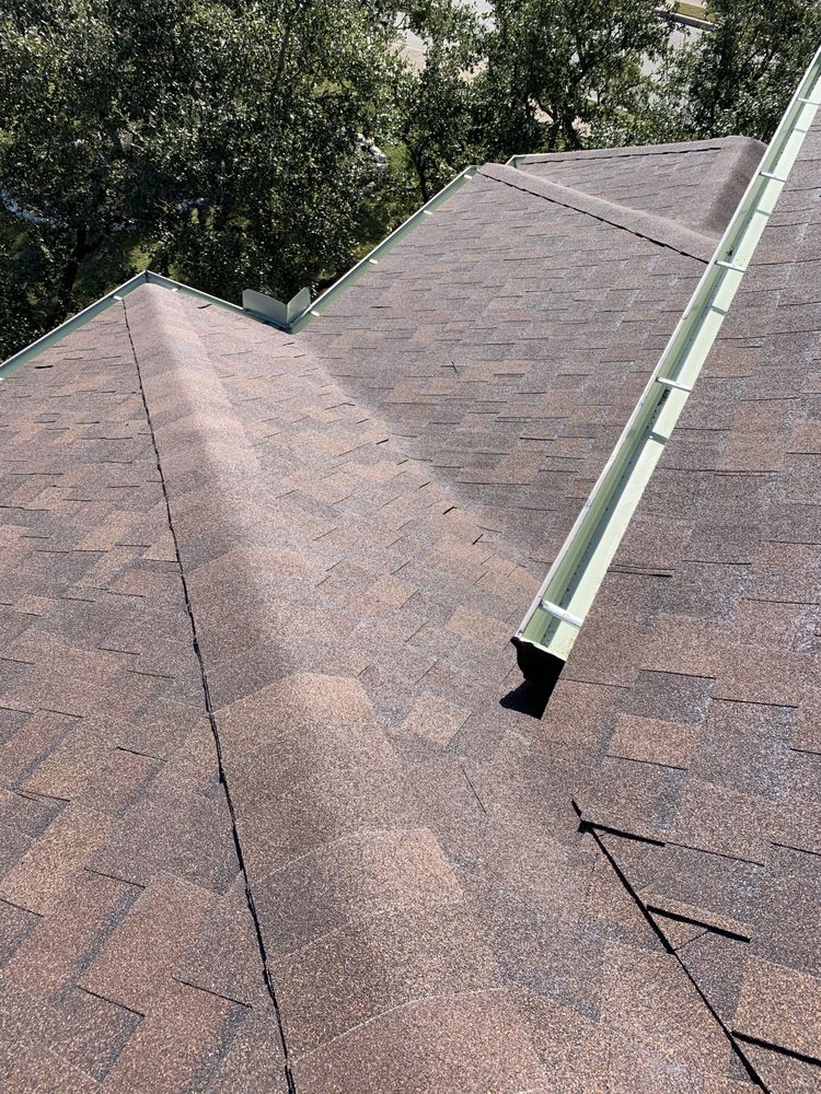 Slide of Informed Roofing & Restoration