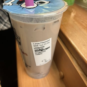 Sip A Tea - The Bubble Tea Experts - a plastic cup with a purple straw - Bubble Tea Near Me - Calgary, Alberta Sip A Tea - The Bubble Tea Experts - a plastic cup with a purple straw - Bubble Tea Near Me - Calgary, Alberta