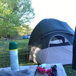 Annies Campground - Tent area is nice and spacious and has tree cover, a fire pit and picnic table.