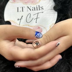 L T Nails