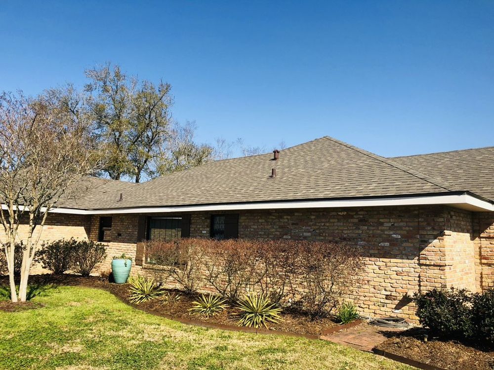 Slide of Pelican Roofing Company