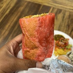 Burrito Bomba - Half of a Breakfast Burrito with bacon