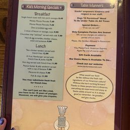 This part of the menu says you can bring your dogs as long as they remain u see the table at all times! This part of the menu says you can bring your dogs as long as they remain u see the table at all times!