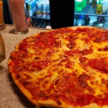 Tino's Bar & Pizza - Pizza and beer. Mana of the gods. - Pizza Near Me - Negaunee, Michigan Tino's Bar & Pizza - Pizza and beer. Mana of the gods. - Pizza Near Me - Negaunee, Michigan